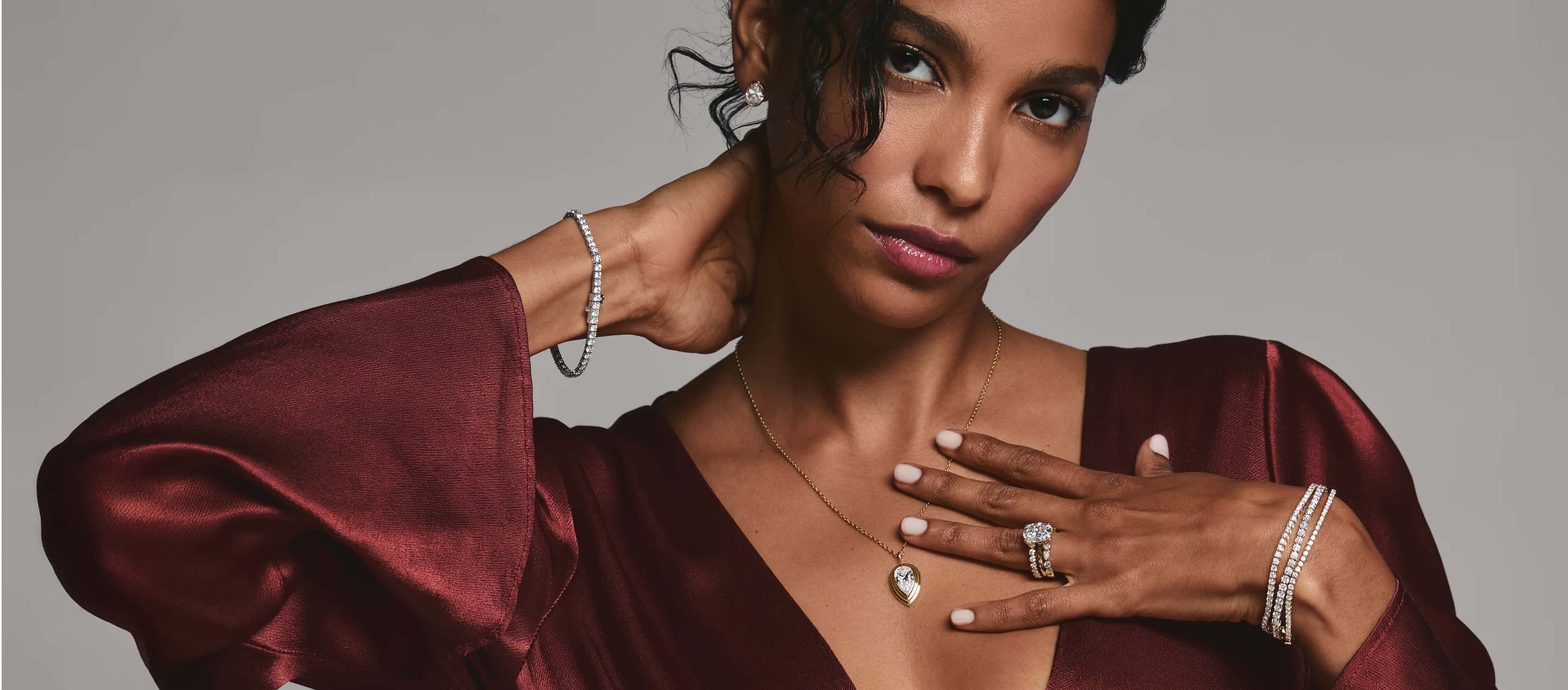 A close-up of an engagement ring with text overlay reading 'Find the Perfect Ring, Make it yours' against a dark background