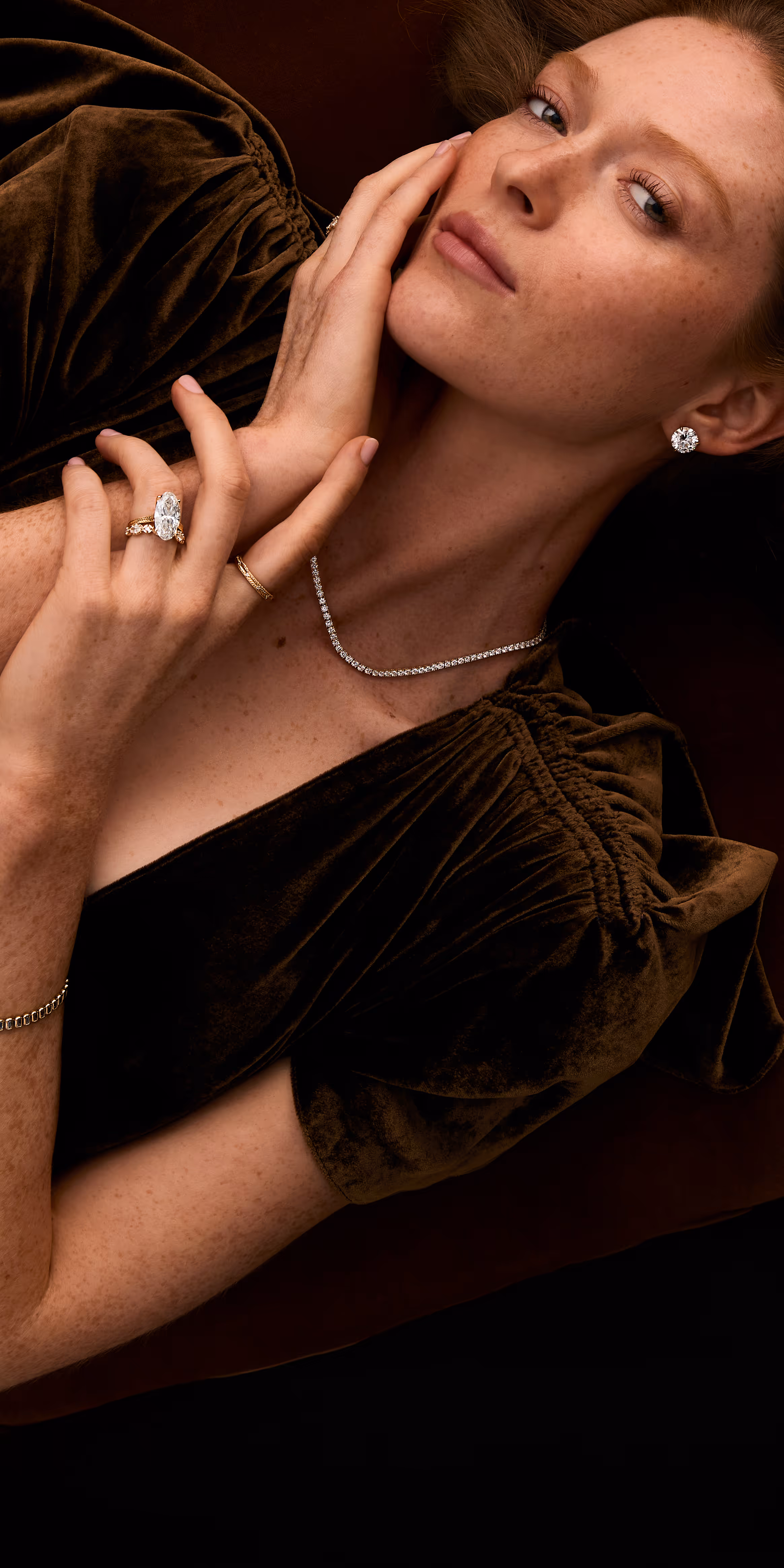 A close-up of an engagement ring with text overlay reading 'Find the Perfect Ring, Make it yours' against a dark background